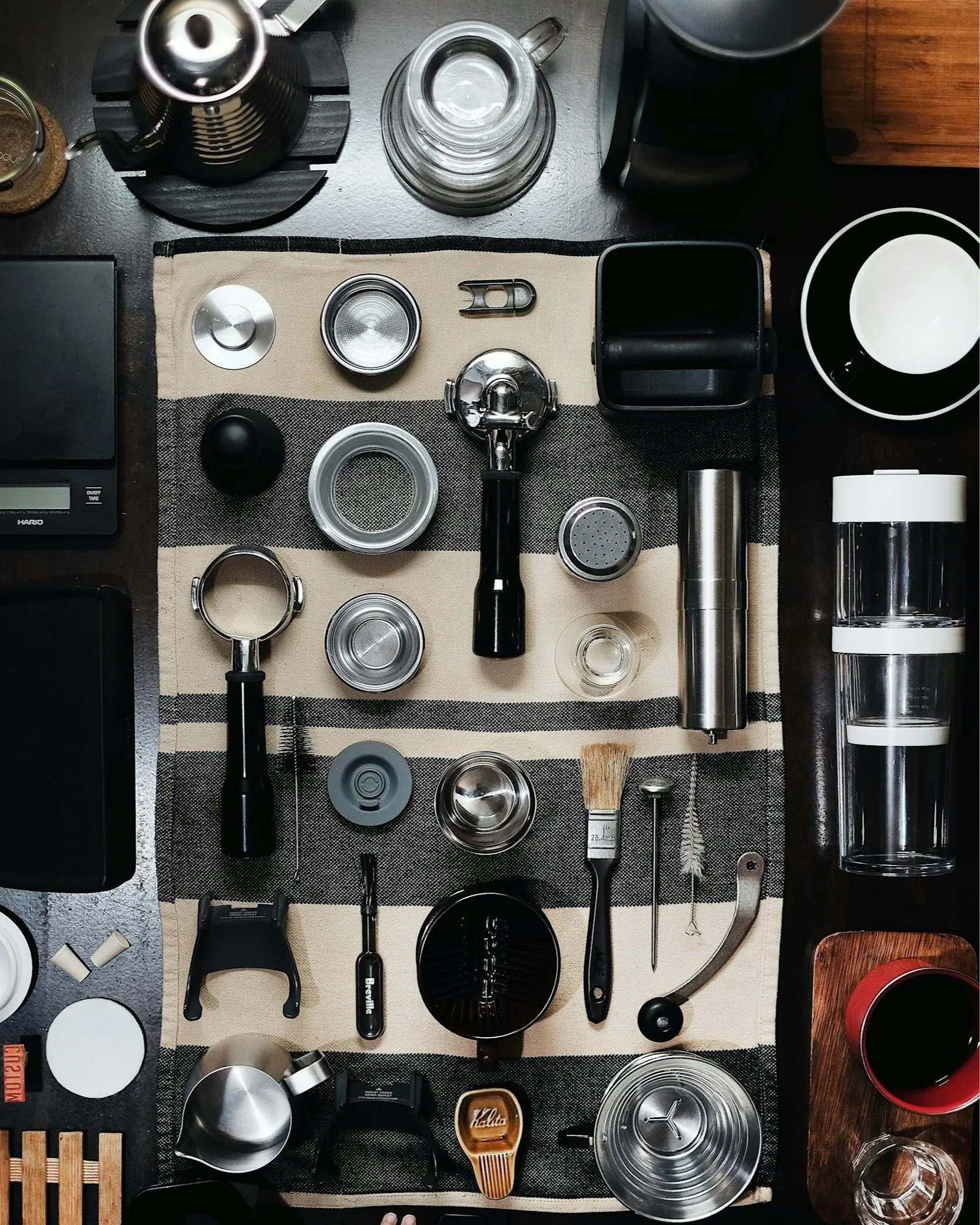 overhead view of a table with coffee accessories and tools